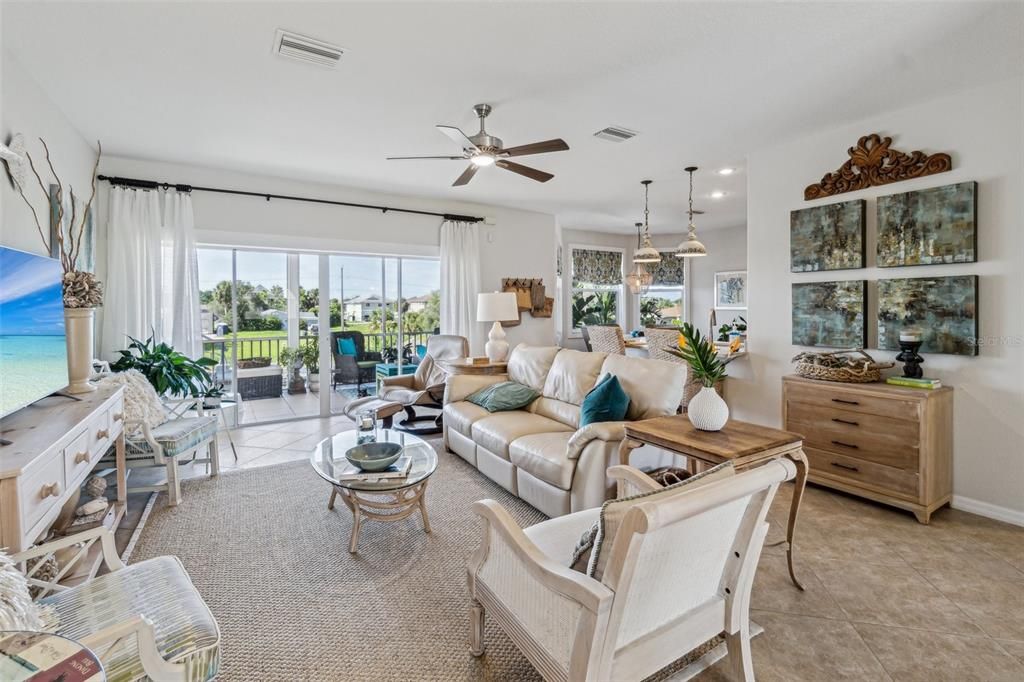 Living room with sliders to screened porch