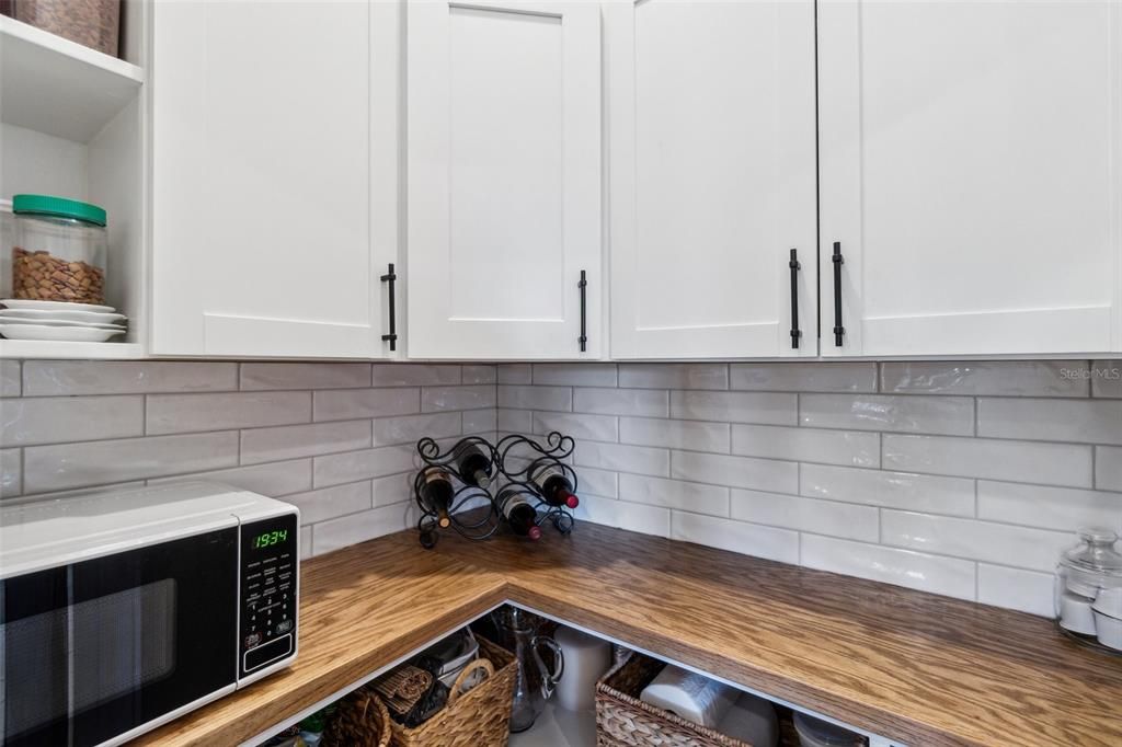 Plenty of storage and light in the pantry