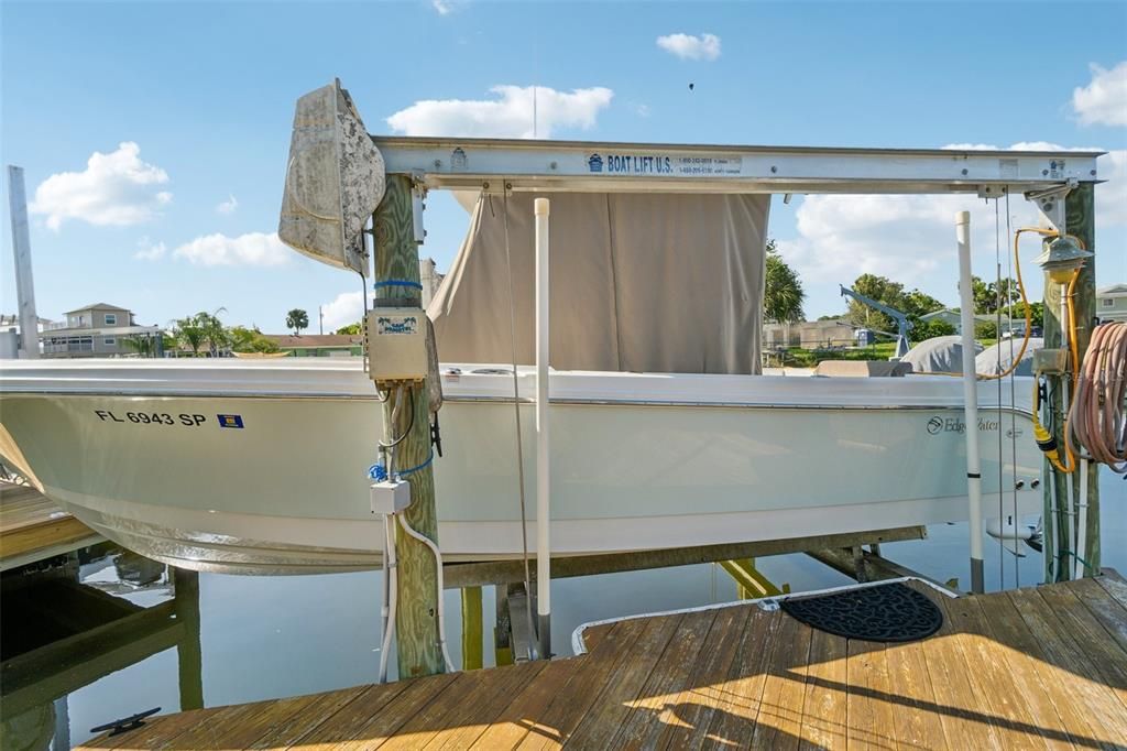 The 10k boat lift currently cradles a 26 ft. Center Console