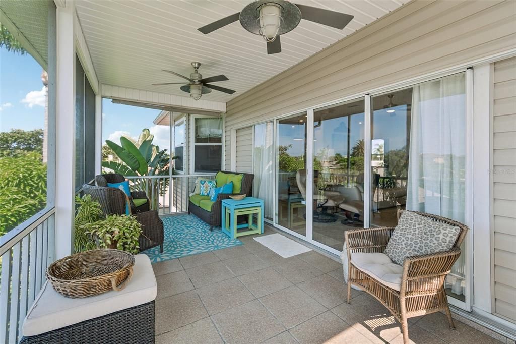 Screened porch with sliders into the living room