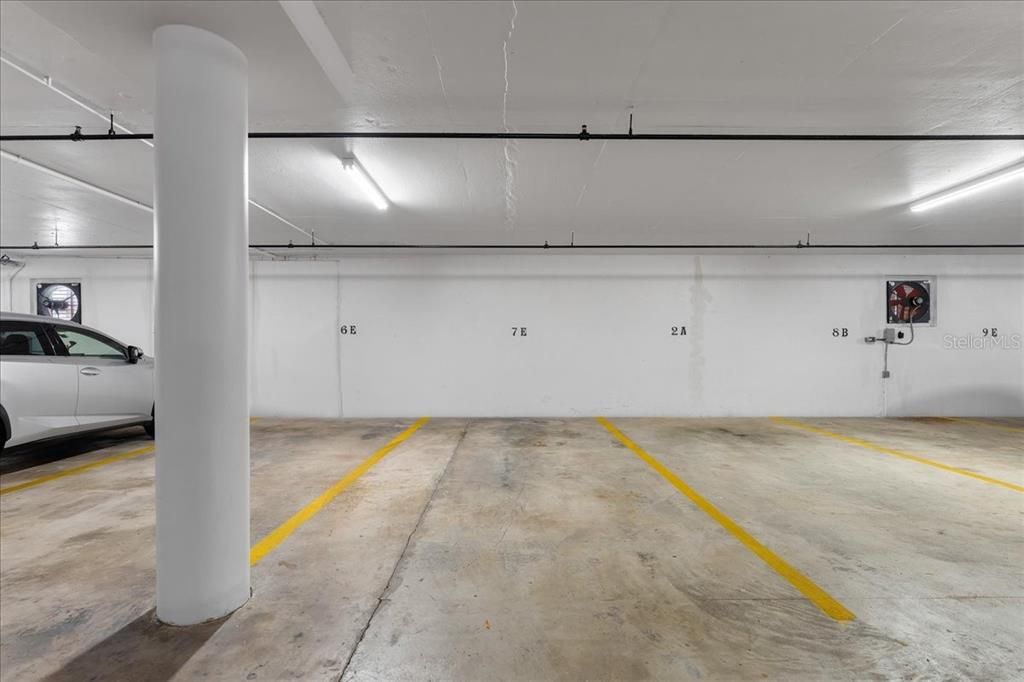 Assigned, underground garage parking space