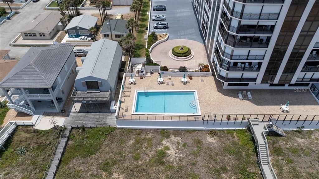 Aerial view of pool and roundabout driveway at Gemini Condominium, Ormond Beach, Florida