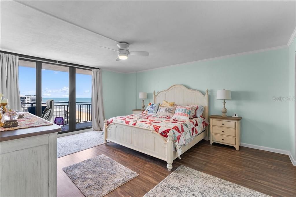 Primary bedroom and north balcony overlooking the ocean