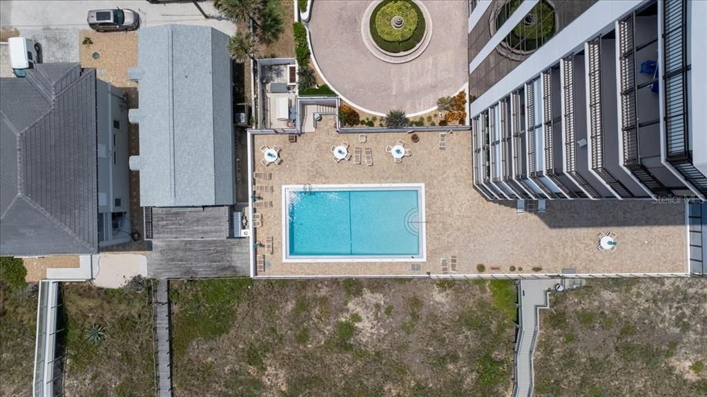 Aerial view of pool and roundabout driveway at Gemini Condominium, Ormond Beach, Florida