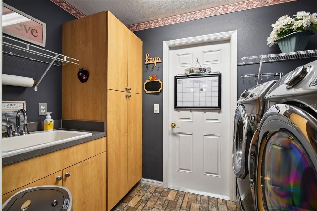 Indoor utility room with washer and dryer.