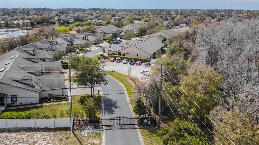 Rear gate and views of Publix shopping center.