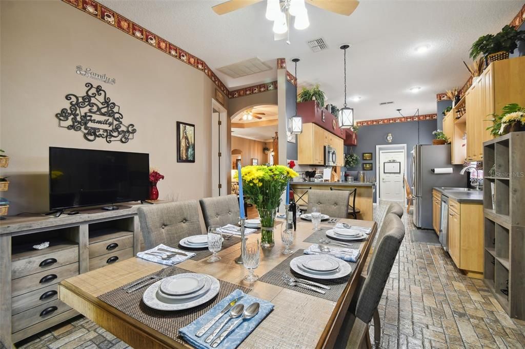 Eating space in kitchen facing towards rear of home.