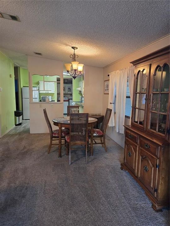 Dining Room 3 (view from great room) You can see the divider wall into the kitchen