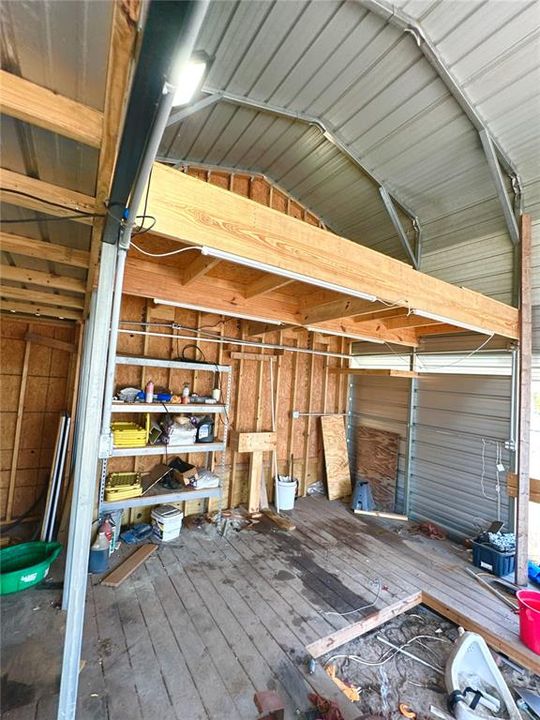 Work space under carport with full electric - previous boat mechanic shop
