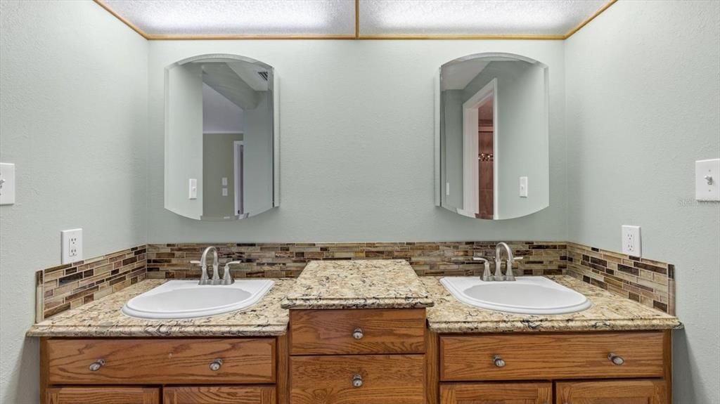 Master bath with double vanity and storage