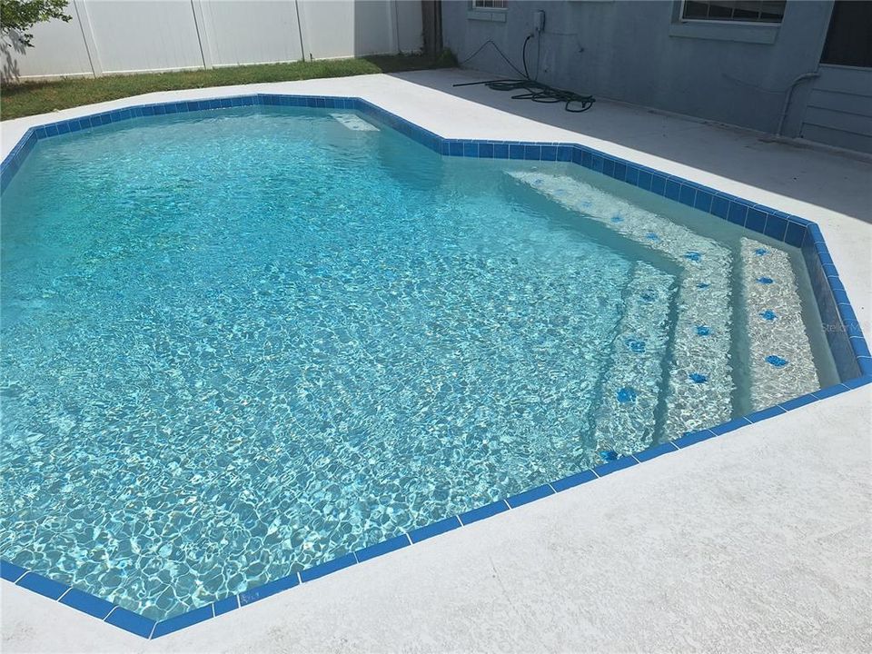 New resurfaced Crystal Krete and tile pool