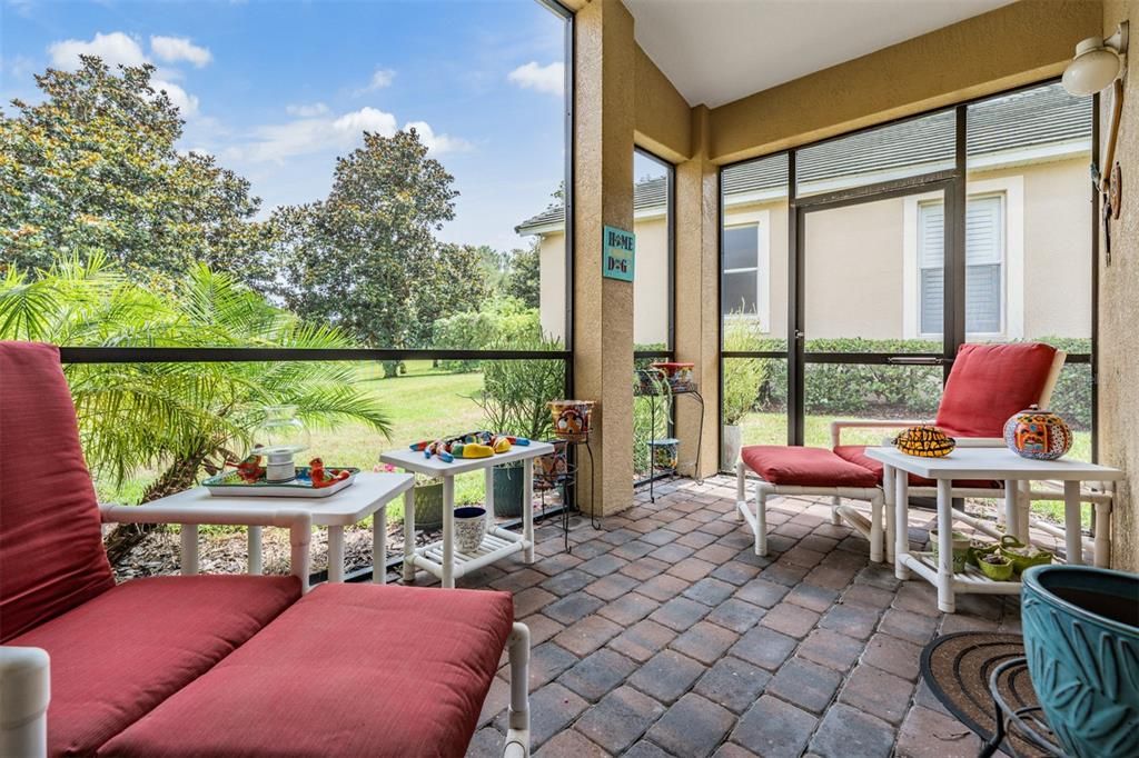 screened lanai overlooks backyard...