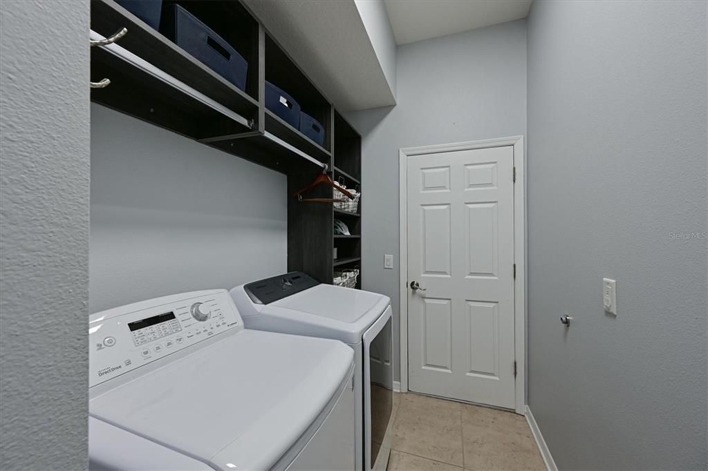 Laundry room with built in shelving