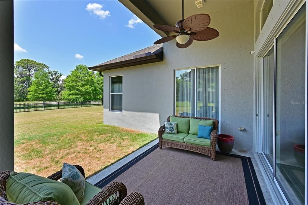 covered porch to huge rear yard!