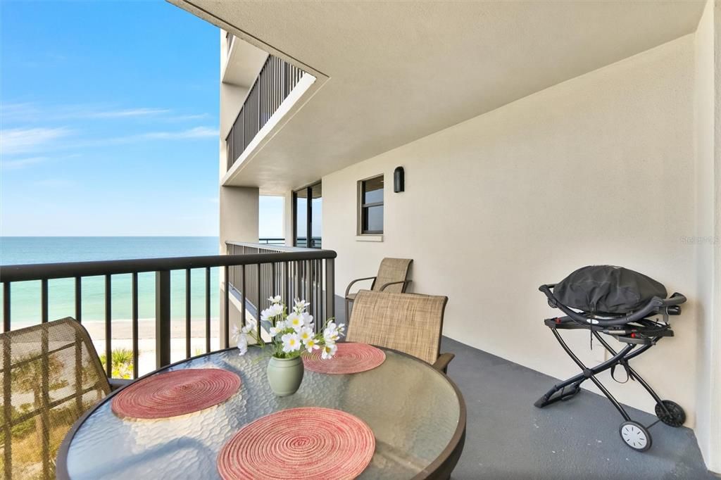 Outdoor Balcony Dining area with views of Gulf of Mexico