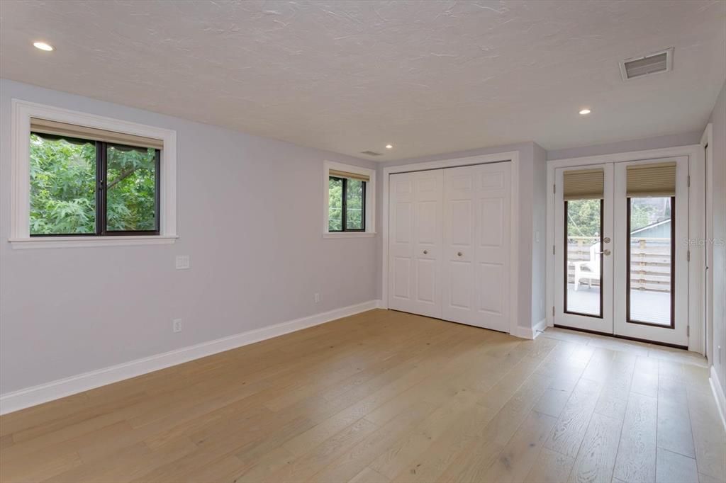 Master bedroom with private entrance to your treetop escape - open patio!