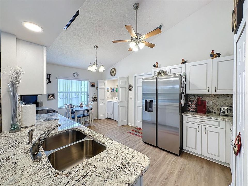 Kitchen has granite countertops