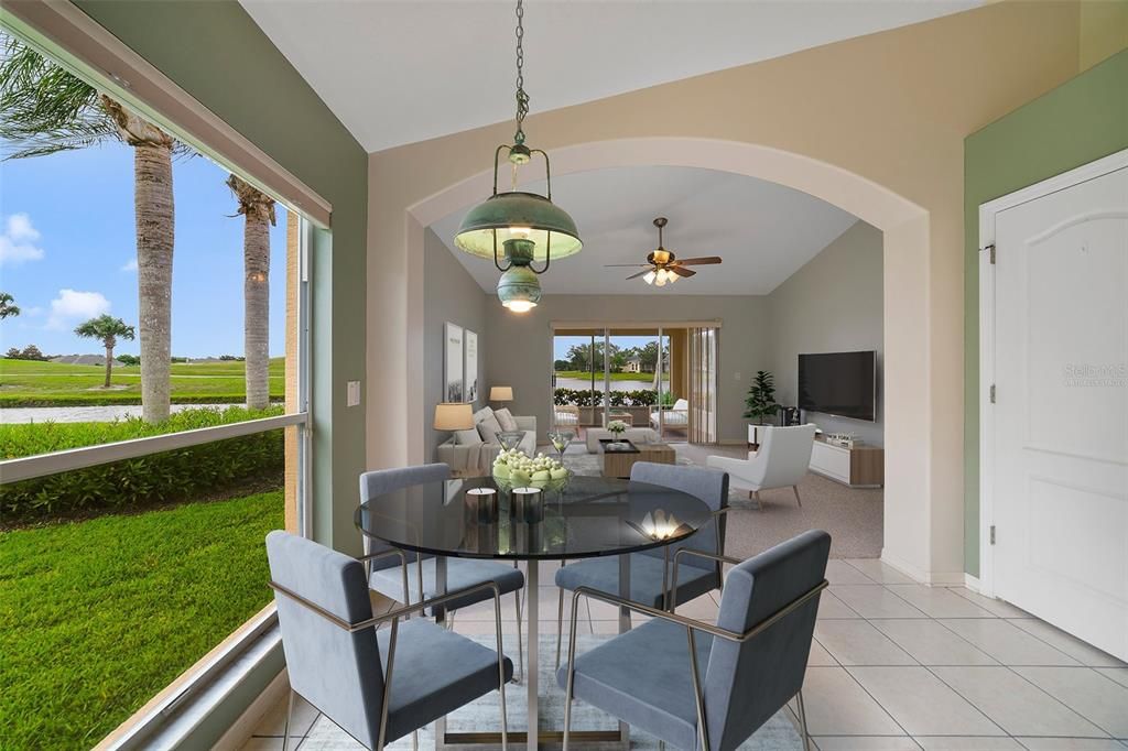 The kitchen flows into a casual dining space and through an arched doorway the generous family room awaits. Virtually Staged.