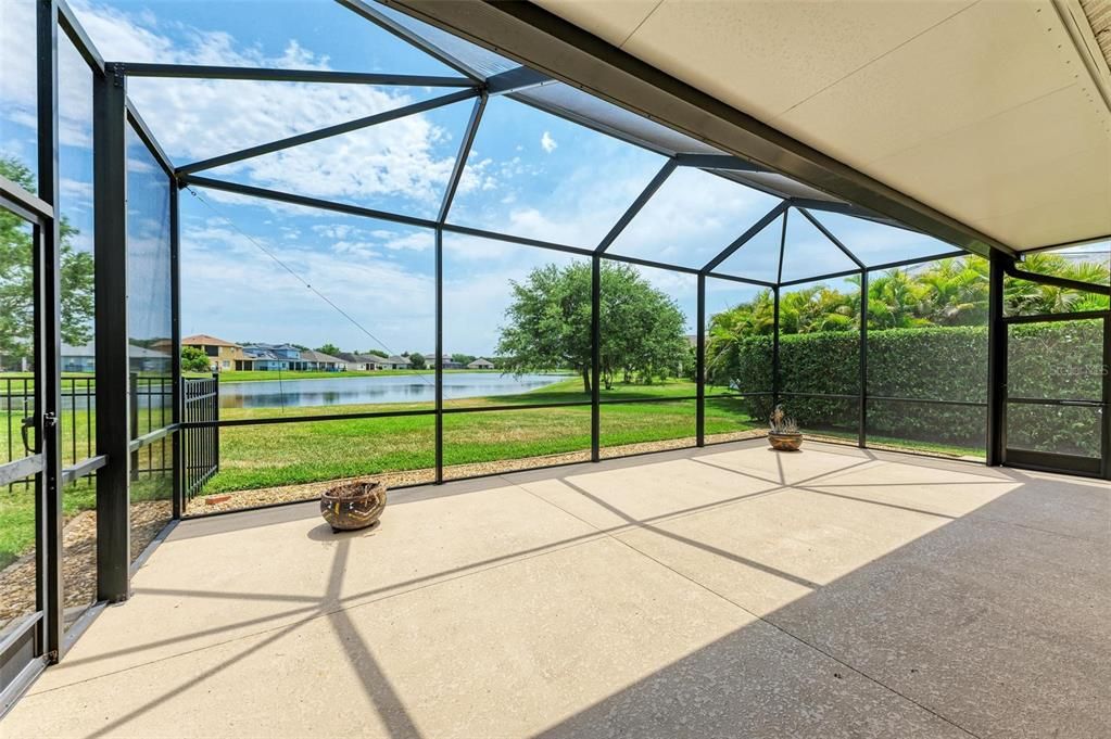 This is a very generously sized outdoor lanai with room to add a swimming pool.
