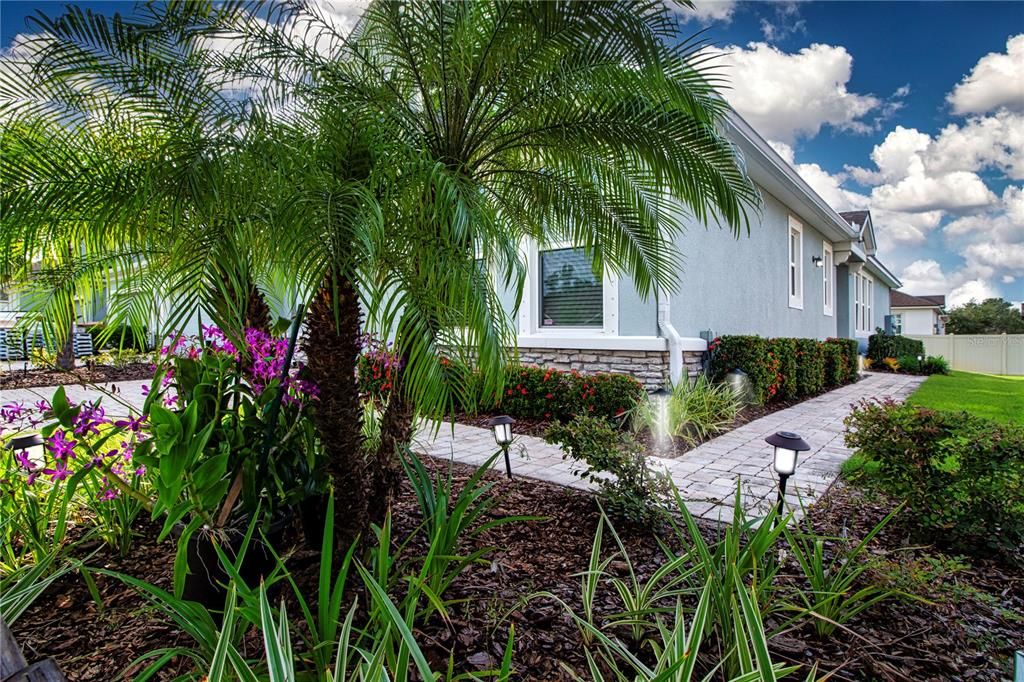 Surrounded by Lush tropical Florida Landscaping with space between your neighbors and enjoy the year round weather in Paradise.