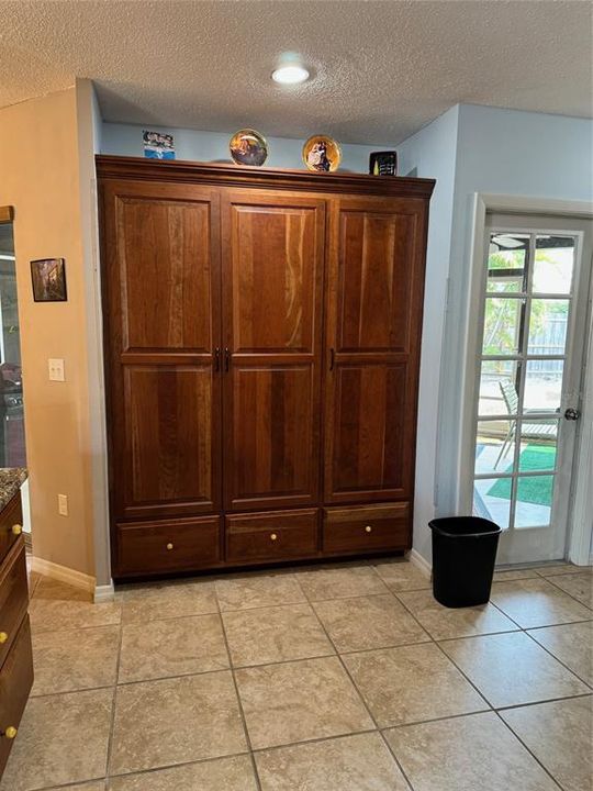 Pantry in the kitchen and door to