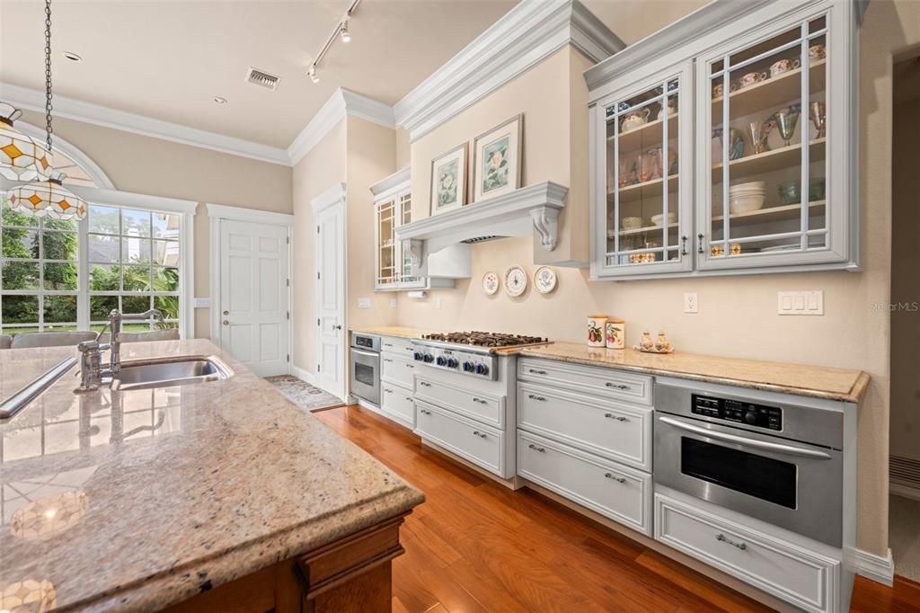 Lovely granite countertops and solid wood cabinets