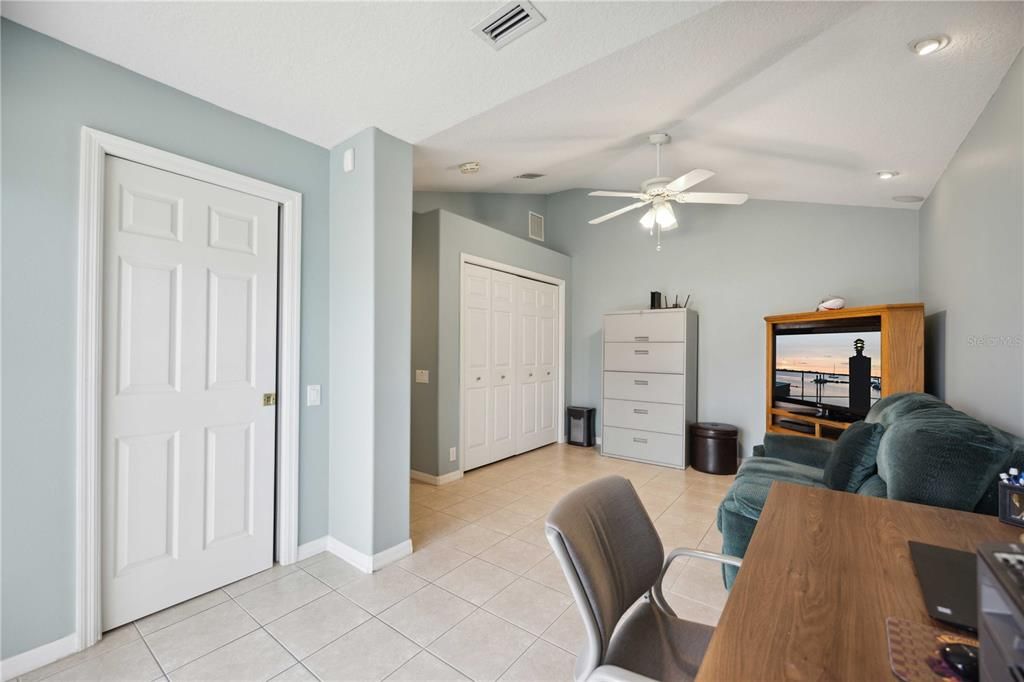 Fourth room in the back of house with vaulted ceiling, perfect for in-laws, family, guests.