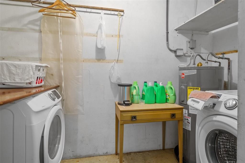 The laundry/utility room is situated at the end of the garage.