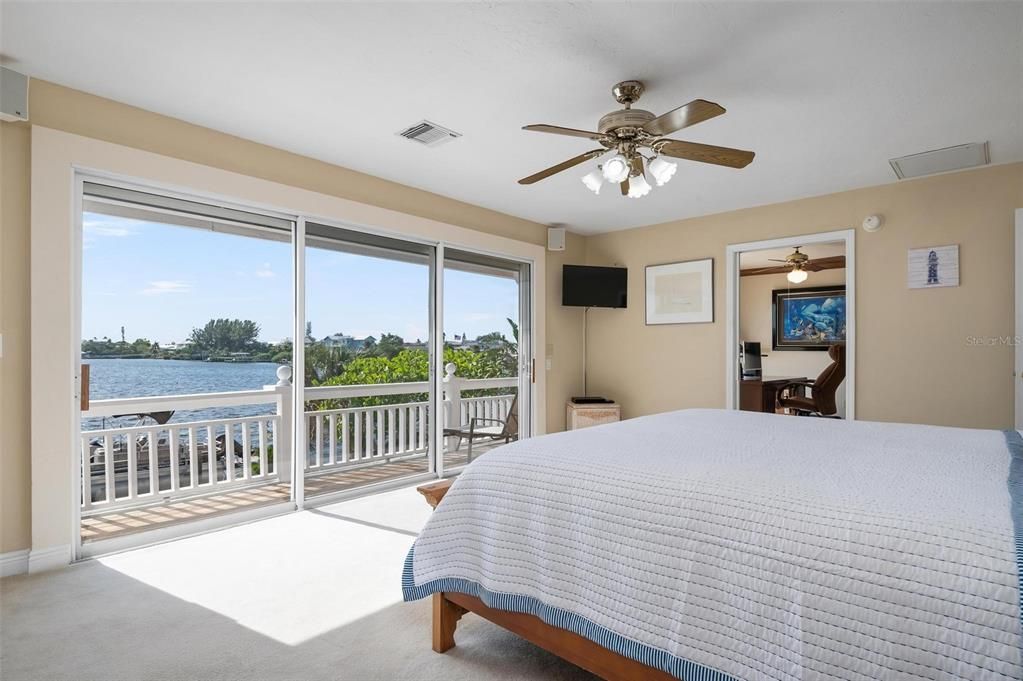 Primary bedroom with private balcony