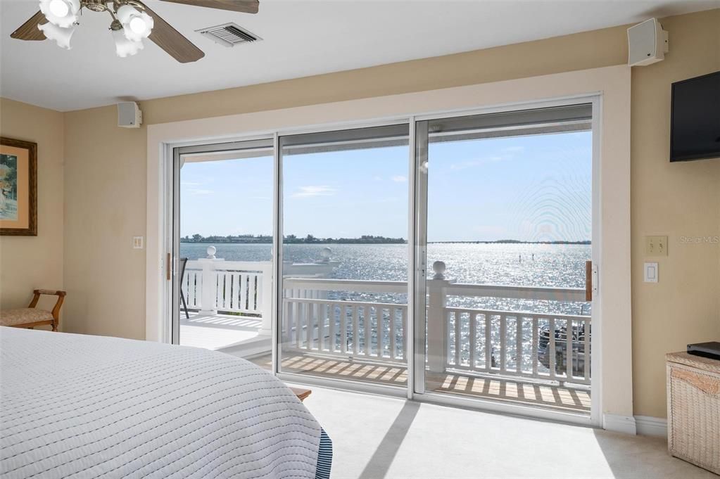 Primary bedroom with private balcony