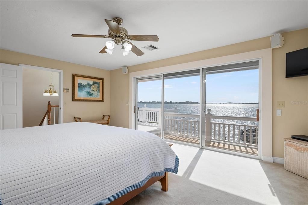 Primary bedroom with private balcony