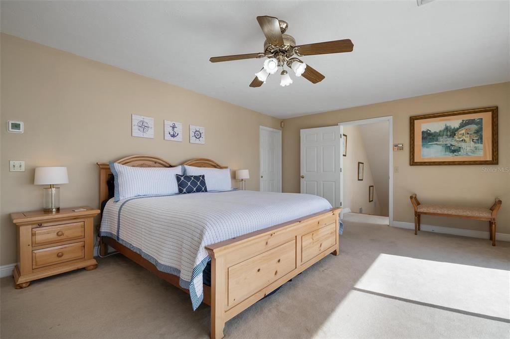 Primary bedroom with walk in closet and ensuite bath