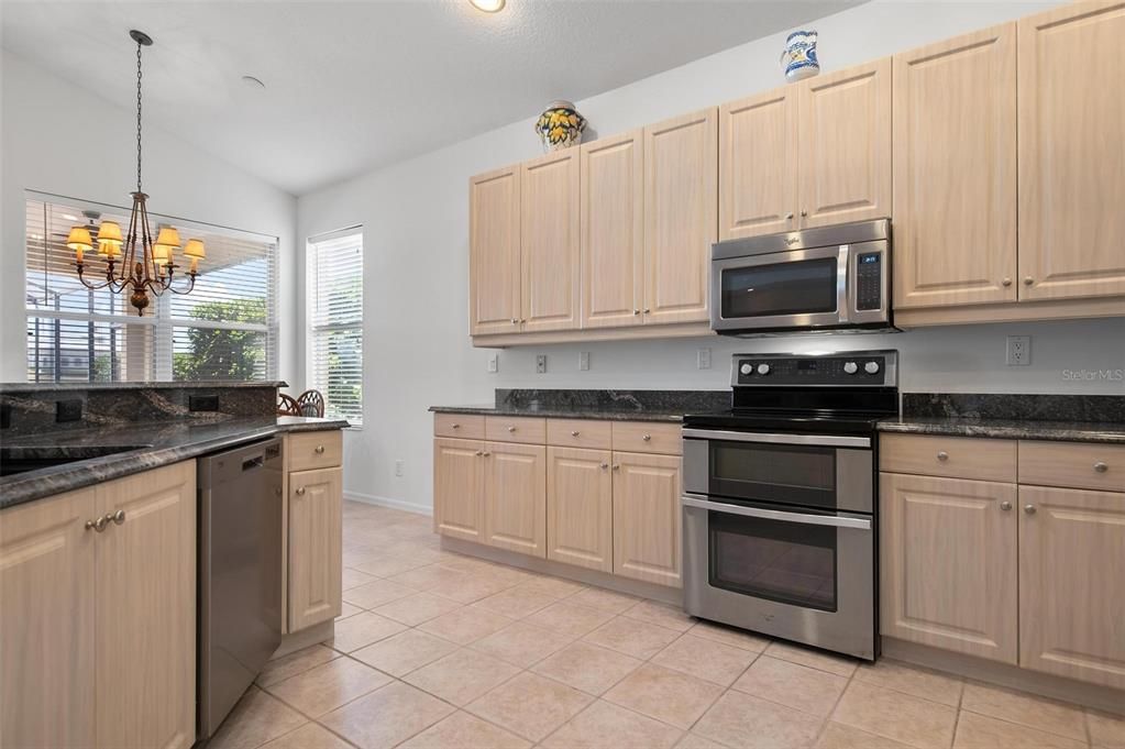 Kitchen with 42" height cabinets, stainless steel appliances