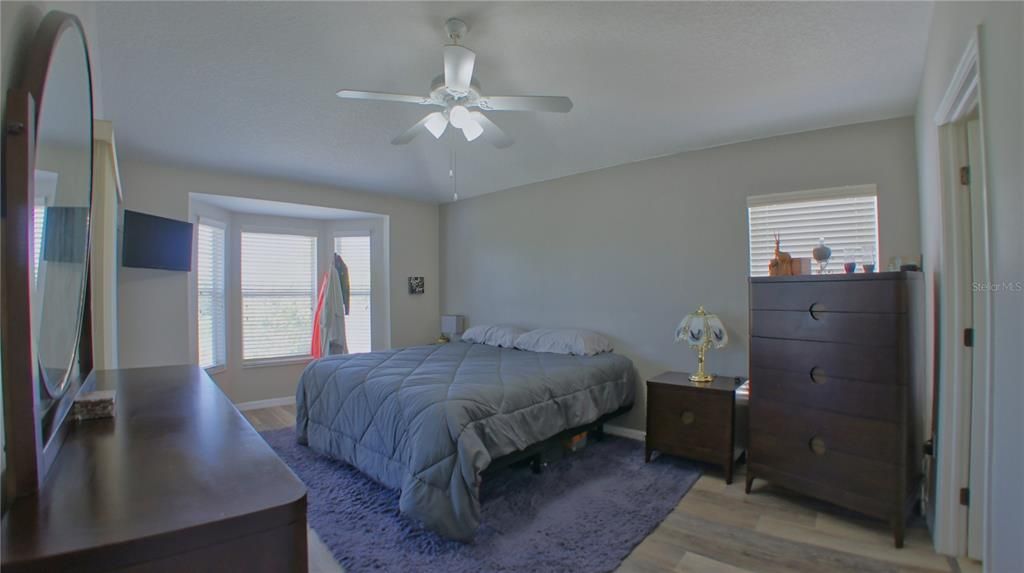 Primary bedroom located along the backyard