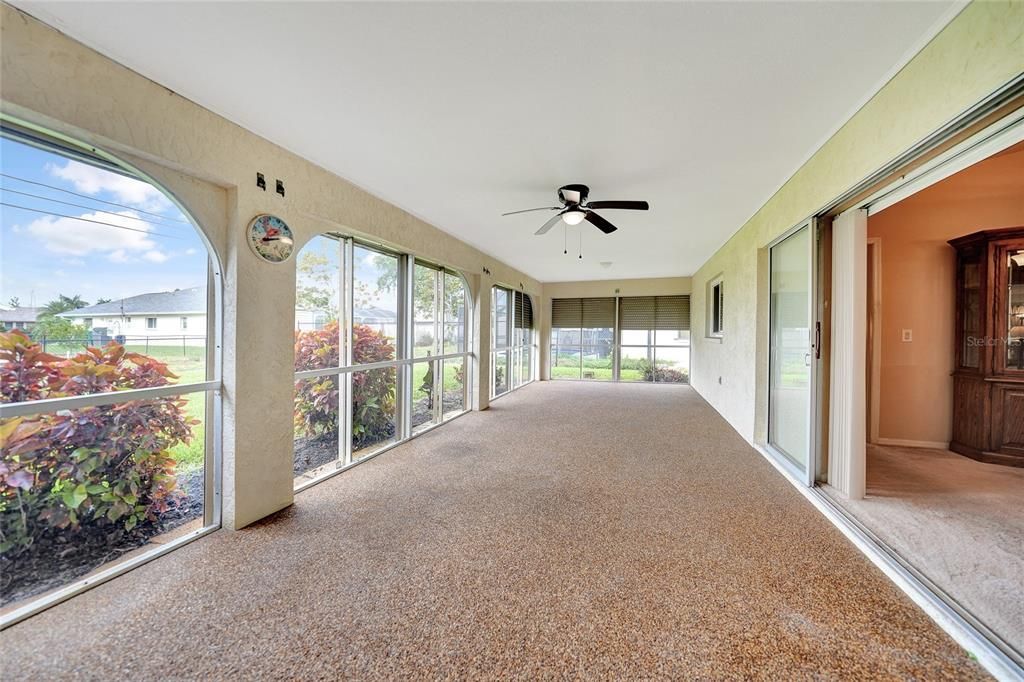 Amazing lanai with hurricane shutters pictured. Pocket sliders to dining room area