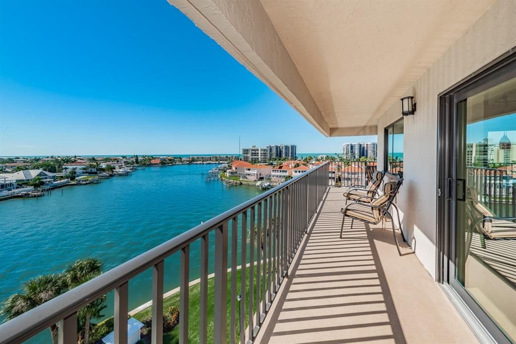 Presenting Harborage II # 266 Gated Waterfront Community. 6th Floor Light and Bright Residence Offering the Warmth of Southern Exposure and Panorama of Intercoastal, Gulf and Marina Views Including Fabulous Nightly Sunsets and a Short Stroll to the Pristine Sand Key Beach.