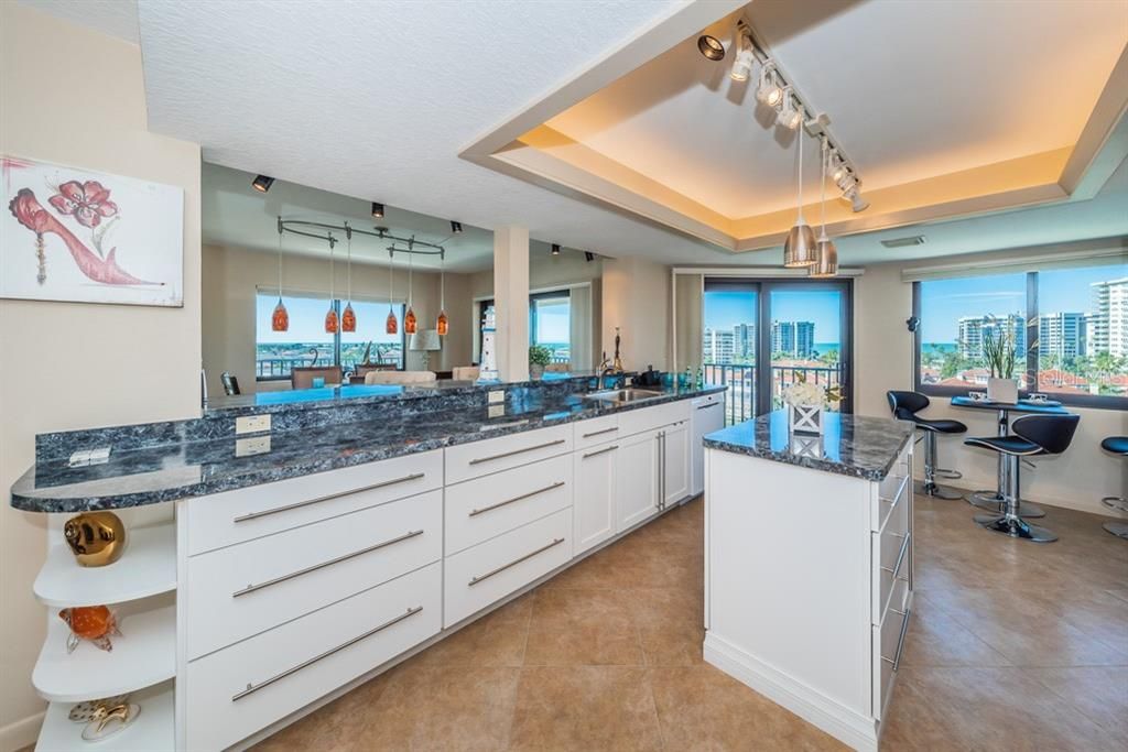 Light & Bright Kitchen features include new stainless steel appliances, wine fridge and new white shaker style cabinets & Island.