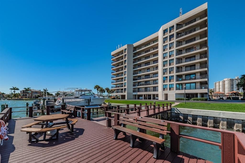 Amenities include 24 hr gated security, waterfront heated pool, tennis, fishing pier, grill, picnic area and your own reserved covered parking space!