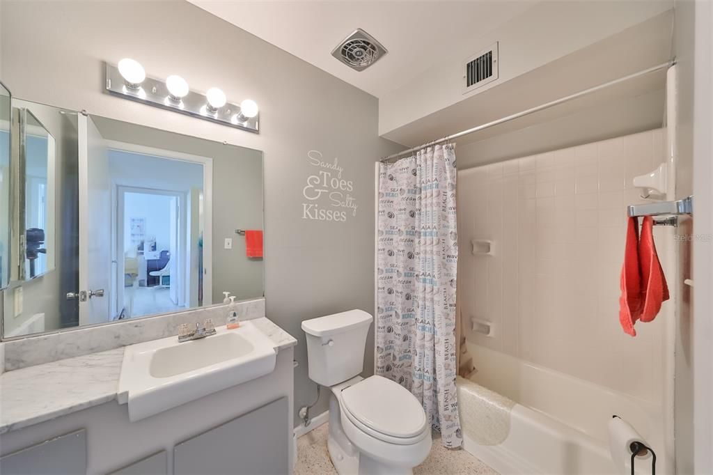 Guest bathroom has been updated with a contemporary feel.