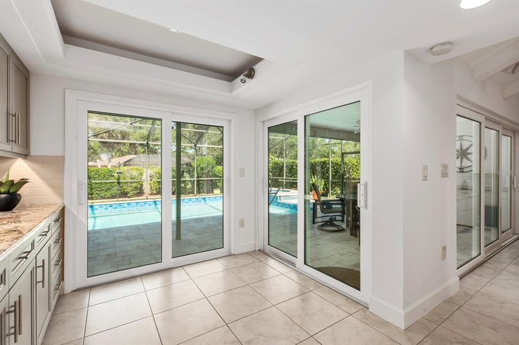 Bright Breakfast nook with Sliders to the Lanai