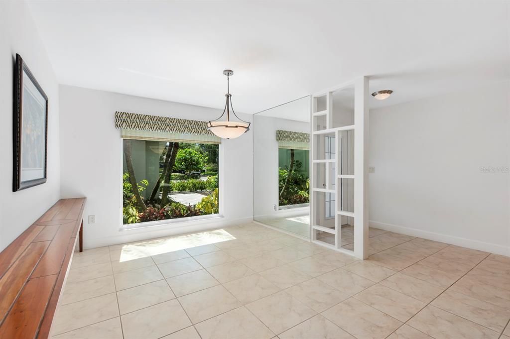 Dining Room overlooks lovely courtyard garden