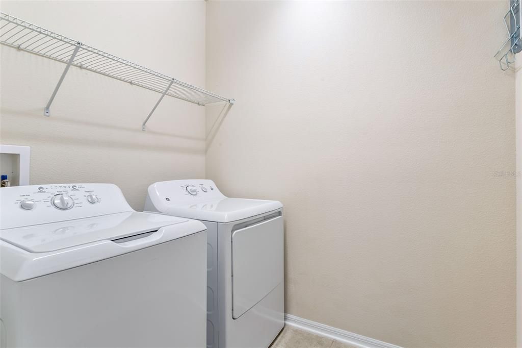 Laundry room on second floor with easy access to all bedrooms & closets.