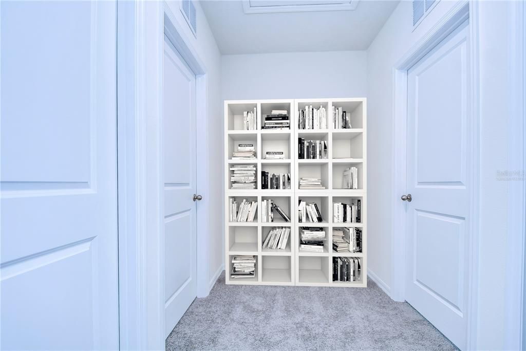 Virtually Staged - Down Hallway - Large Space to Put A Bookshelf