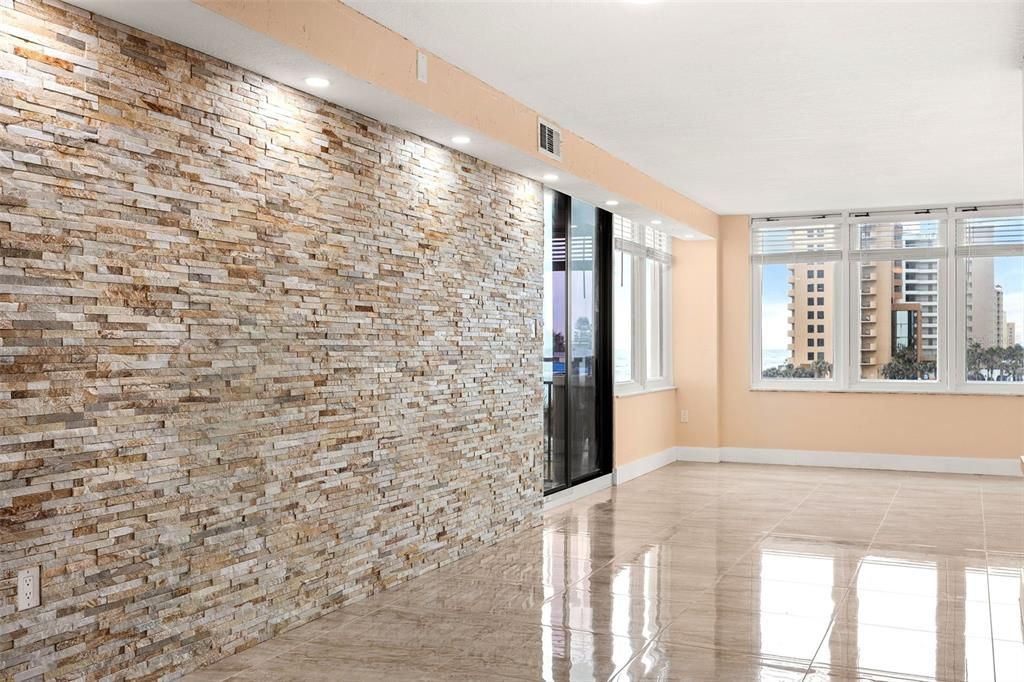 Extensive renovations with all new flooring and travertine accent wall