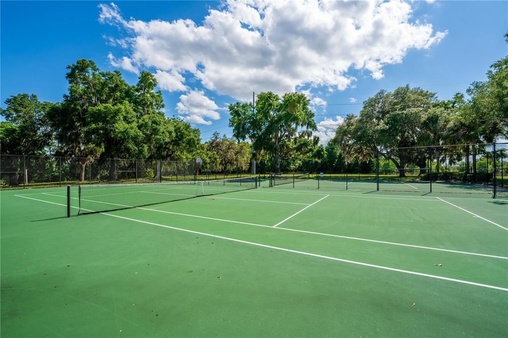 Tennis courts with Basketball hoops
