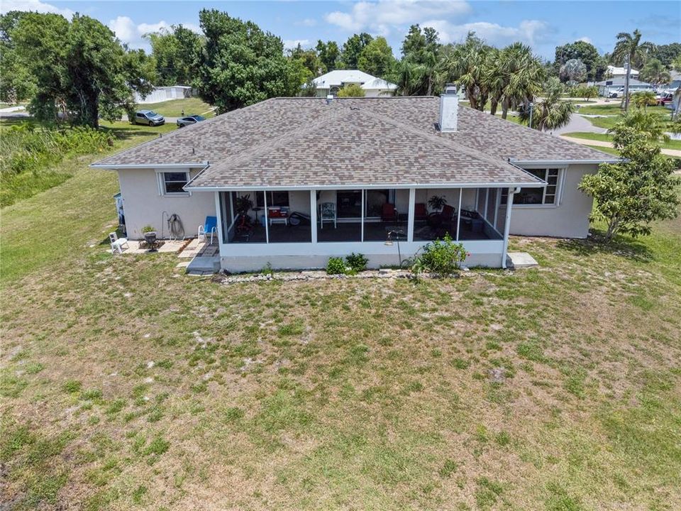 Drone shot of the back of home and yard