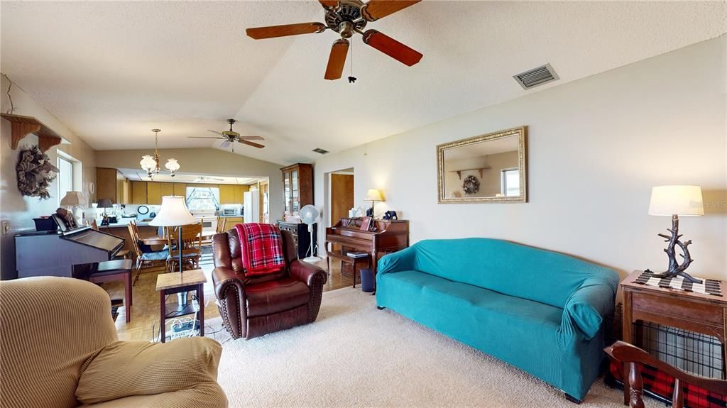 Living room with sliding doors leads out to lanai