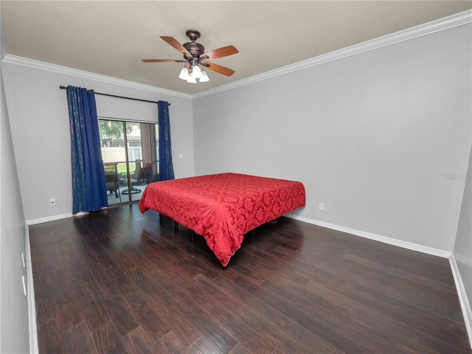 Spacious Primary Bedroom with Crown Molding