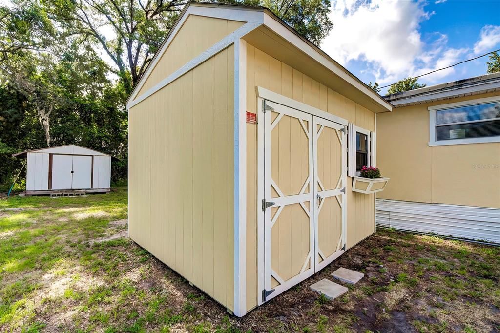 Adjacent shed contains laundry room