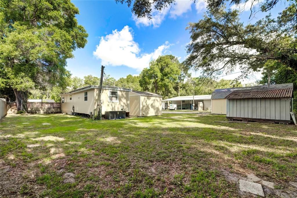 Rear view of back and side yard